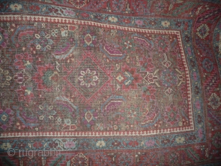 an early north-west persian long rug, possibly kurdish, with a very unusual colour palette, all natural with different purples and light indigo abrash. ends and selvedge partially worn but more or less  ...