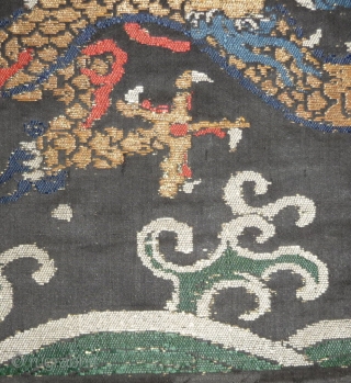 early 18th century silk brocade fragment with gilded paper threads. probably lower part of a dragon robe. china.               