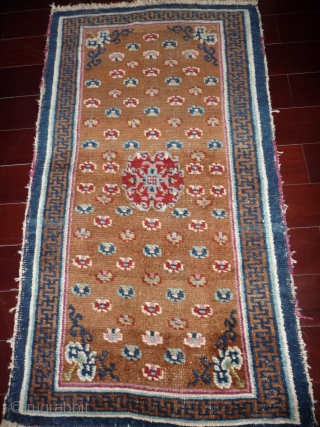 a wonderfull antique tibetan khaden with glorious intense natural colours. fantastic red and light green... it is in very good condition for its age except for some areas of low pile to  ...