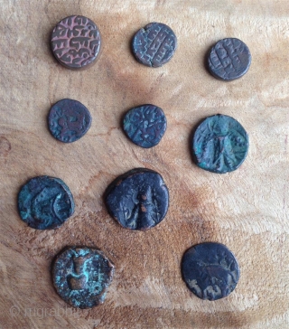 10 coins from the ancient silk road dating approximately from 3th to 6th century depicting talisman, animals, warriors, script, pearl roundel like design etc...  exchange possible, low rate..    