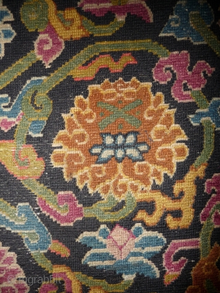 wonderfull tibetan seat with lotos blossom design. excellent weave and condition. tibet around 1900. 51x 76cm                 