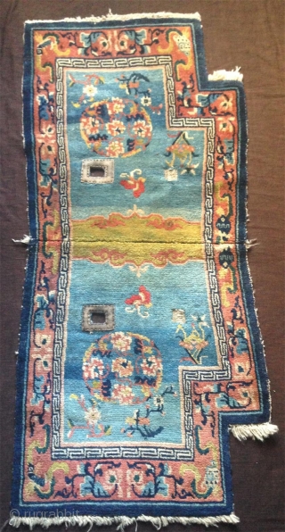 late 19th century tibetan saddle rug with superb all natural colors and fine wool.very nice abrashed light blue field and wonderful light green center..very good condition with super fine wool.   