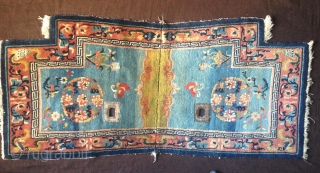 late 19th century tibetan saddle rug with superb all natural colors and fine wool.very nice abrashed light blue field and wonderful light green center..very good condition with super fine wool.   