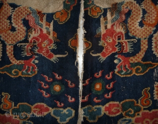 a powerful tibetan saddle rug.                            