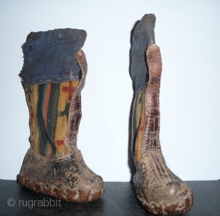 rare pair of tibetan child boots. leather and pulo wool.tibet, early 20th c. or before.                  