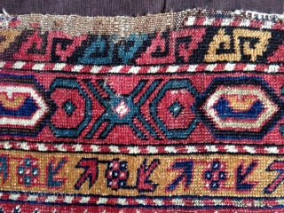 an antique small (115x 84cm) caucasian rug possibly avar with wonderful intense well patinated natural colours. very nicely woven the pile feels like velvet..uncommon main border.. there is no repair except for  ...