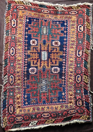 an antique small (115x 84cm) caucasian rug possibly avar with wonderful intense well patinated natural colours. very nicely woven the pile feels like velvet..uncommon main border.. there is no repair except for  ...