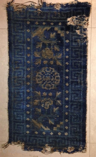 looks probably baotou to many people but it is most proably xinjiang. super fine wool, camel weft, single key border with double key at the four cardinal points. an interesting and quite  ...