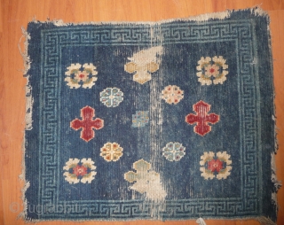  tibetan wool mat with an interesting design. seems to have been used as a saddle top for a while. but i don t know if  it was made originally for  ...