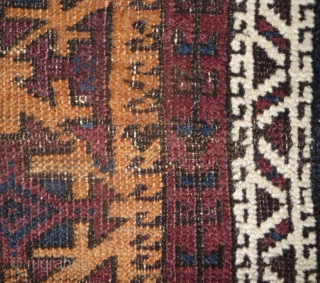 beautiful baluch prayer rug with prayer wear.attrativ hand panel and turkmen field design with a strong reciprocity effect.lots of interesting small amulets. all natural colors with very nice apricot ground color.silk highlights  ...