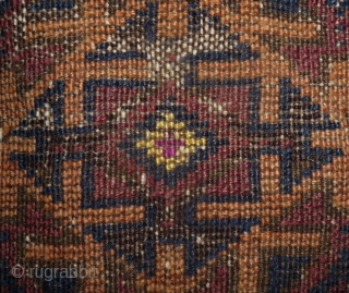 beautiful baluch prayer rug with prayer wear.attrativ hand panel and turkmen field design with a strong reciprocity effect.lots of interesting small amulets. all natural colors with very nice apricot ground color.silk highlights  ...