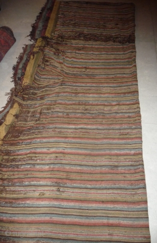 by many points is this old tibetan stripe-weaving textile a rarity:
it is around 400x180cm (it was possibly a tent divider)
it has fantastic well patinated natural colors, including light purple, pink, carmine rot,  ...