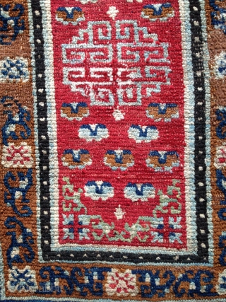 mid 19 th century tibetan saddle top with beautiful wool and natural colors. saddle rugs with this design are not common. it is most probably  part of the set of which  ...