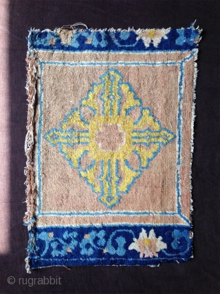 attractive second half 18th century ningxia fragment with double vajra or dorje design and very nicely drawn lotus border. superb wool and well preserved colors and thick pile and thin price...  