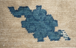 this an early chinese rug in fragmentary condition but this is not a fragment of bigger rug as is is attested by the original ends and selvedge. the fact that it looks  ...
