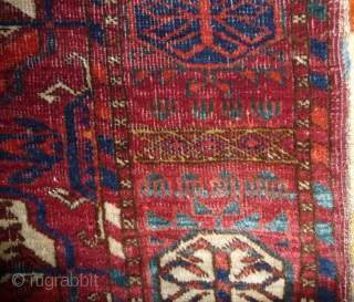 Early tekke main carpet  fragment (cut and shut at top, missing 1 row of guls)with a rare elem, fantastic fine wool and colors including ruby red highlights and very fine weave.  ...
