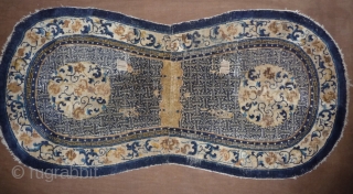 very finely woven rare white ground 18th c. ningxia saddle rug. lots of swastika x lots of bats = wanfu (lots of luck), china.         