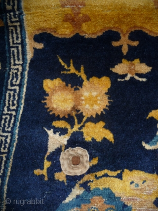 finely woven with top quality wool chinese ningxia under saddle. 4 lion-dogs medaillon design rarely seen on saddle rugs.  mid 18th century, 140x 67cm.        