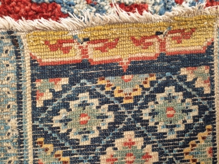 one half of a very unusually small saddle rug 36x 52cm
great naturall colors including a goldish yellow and deep aubergine. super weave and wool not later than late 19th century  detail  ...