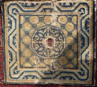 a rare early ningxia square with a bold powerfull design. interesting goli-guli center and attrative meander border, an esthetic usually seen on central asian rugs.. 63x 67cm      
