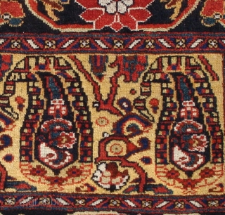 Afshar Bagface, South Persia, 2'0'' x 2'11'' circa 1880. Fine drawing of botehs on a yellow ground with a bold border. Excellent condition complete with flat-woven fasteners. Deep saturated natural color, however,  ...