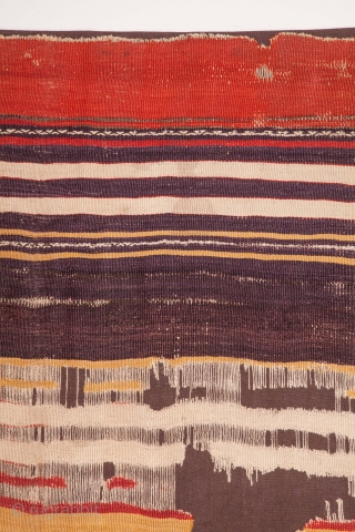 A rare, 18th century kilim. Probably woven in Cappadocia. Minimal and bold with wonderful dyes. Notice the masterful use of three different reds in the middle stripes. Blacks almost completely corroded. Expertly  ...