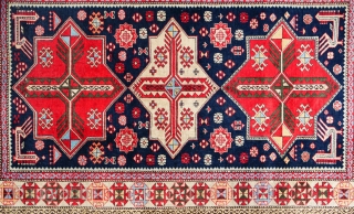 This is a second-half of the 20th century (1970s) Caucasian rug from the town of Shirvan on the shores of the Kura river in Azerbaijan 
It features a classic pattern of diamonds  ...