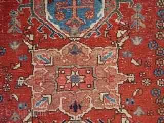 This is a 1900s Karajah 130x95 cm or 4.3x3.1 feet in overall OK condition with traces of use and age. Note some wool discoloratio around the border 

     