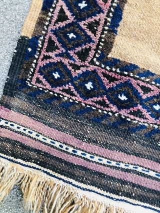 A nice Camel ground Baluch about 80-90 years old,the border is rug and the middle is Kelim.in a very good condition.            