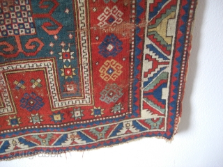 An antique Kazak prayer rug with the size 162 X 105 cm. Open sides, used parts. No repairs, no tinting, no cut. Good colors.         