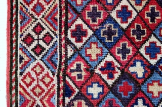 Shahsavan pile bagface, late 19th c., 21" x 23".  Shahsavan pile bag featuring a diamond lattice field enclosing multicolored crosses. An interesting border design and lovely natural colors.    