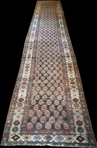 Antique 18' long Persian Heriz runner with unusual paisley pattern. It is 3' in width.                  