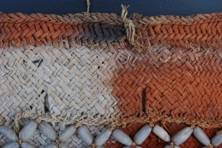 Ethnographic Asmat tribe plant fibre bag with plant seed "beads" and feather decoration 21 x 26 cm (8" x 10") Papua New Guinea. Condition: very good, mounted on a frame.   