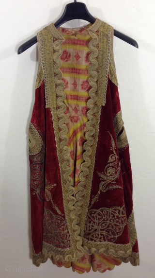 This is a beautiful long sleeveless vest made in either Greece, Turkey or Albania. (The Ottoman Empire) i am not positive although i think It is Turkish. It is made of dark  ...