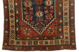 Shirvan, Caucasus, 100 years old,, 186 x 106 cm.
6.2 ft. x 3.5 ft. wool on wool knotted. Natural dye. Low pile, the edges festooned again.        