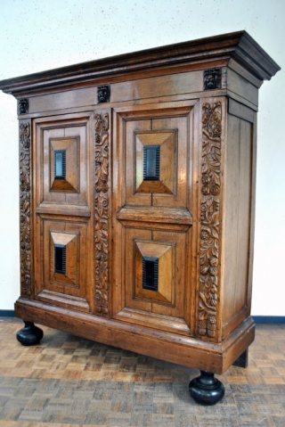 Dutch 2nd half 17th century 'Kussen kast'. Oak and walnut original lock and key. 
In very good condition. 
High 188 Cm. wide 183 Cm. deep 60 cm. 
Drawers inside. 
Comes in a  ...