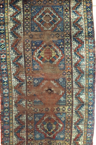 Karabach, 1900 - 1915, beautifully worn rug. 190 x 101 Cm. 
Border with Zoroast symbols, fire and fire torch. 
             