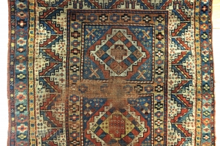 Karabach, 1900 - 1915, beautifully worn rug. 190 x 101 Cm. 
Border with Zoroast symbols, fire and fire torch. 
             