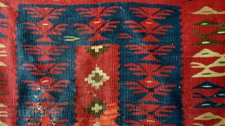 Rare and fine 1850 - 1870 Bulgarian kilim. 
it has an old band sewn on with brass rings.
Always was a wall hanging - it preserved this kilim. 
'as is". 
94 x 180  ...