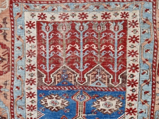A Ladik/Fertek Prayer Rug, Nigde region, central Anatolia,  6ft x 3.7 ft. (182 x 114 cm.)  Circa 1800. This Tulip Ladik/Fertek rug is divided in four sections with a central  ...