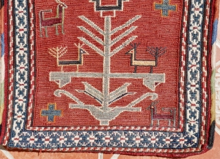 An antique Shasavan saltbag, 35 x 45 cm. early 20 th. century. Beautiful tree of life design, flanked by bocks and peacocks. Woven in the soumac technique.
Nice colours, inspite of some orange,  ...