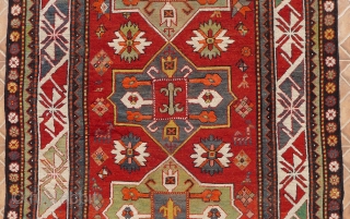 Outstanding Gendje/Bordjalou Kazak, 19th. century. The design with three "Akstafa" medallions in mint green and mid-blue. Each medallion with a central square and a typical Bordjalou "fleur-de-lis" motif.  Bold white ground  ...