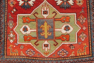 Outstanding Gendje/Bordjalou Kazak, 19th. century. The design with three "Akstafa" medallions in mint green and mid-blue. Each medallion with a central square and a typical Bordjalou "fleur-de-lis" motif.  Bold white ground  ...