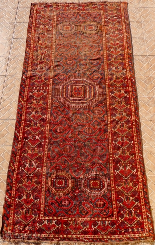 A Beshir Cloudband Main Carpet, Amu Darya region, Turkestan.  348 x 154 cm. 3rd. qtr. 19 th. century.
A few areas of wear and (corner) repair.
       