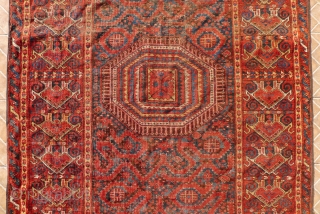 A Beshir Cloudband Main Carpet, Amu Darya region, Turkestan.  348 x 154 cm. 3rd. qtr. 19 th. century.
A few areas of wear and (corner) repair.
       