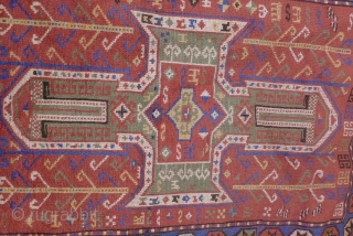 Sewan Kazak, Bordjalou region, 180 x 130cm. (5.9ft x 4.25ft) ca. 1900. The design with a large  mint-green cruciform medallion on a brick-red ground. The main border with a row of  ...