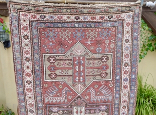 Antique Gendje rug, 6.7ft x 3.8ft. around 1910. Three octagonal medallion type, surrounded by flowerheads and two Akstafa peacocks. Nice mellow pistache geen medallions. However, the pink and a faded purple blue  ...