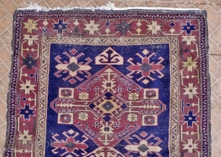 A Shirvan rug, Shirvan city, 4.3ft x 6.75ft. (132 cm x 206 cm.) Circa 1920/30 The design with three Akstafa medallions on an indigo blue ground. Clearly an urban rug, fairly thick  ...