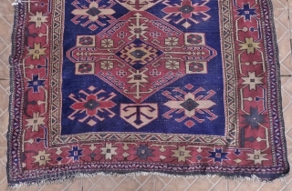 A Shirvan rug, Shirvan city, 4.3ft x 6.75ft. (132 cm x 206 cm.) Circa 1920/30 The design with three Akstafa medallions on an indigo blue ground. Clearly an urban rug, fairly thick  ...