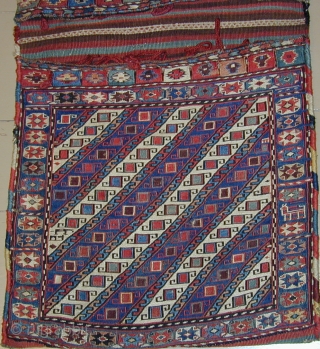 Complete set of mint condition Sumak bags with original side cords, fasteners, and
an array of wonderful colors, 19th. century; overall dimensions: 48" X 23"[123 X 59cm]       